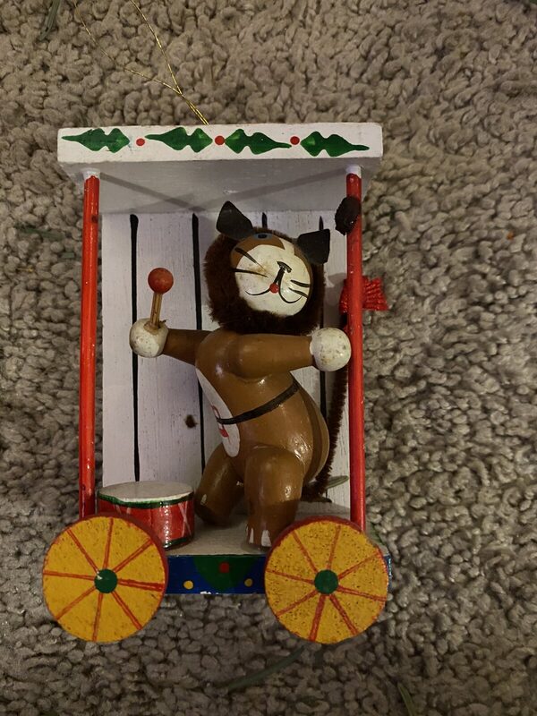 A circus cart in painted wood