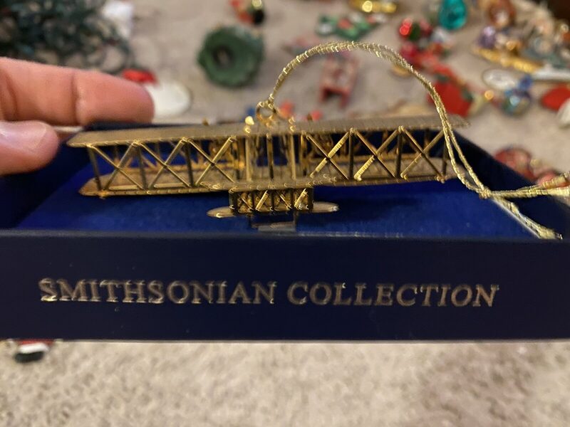 A boxed gilt-brass flyer