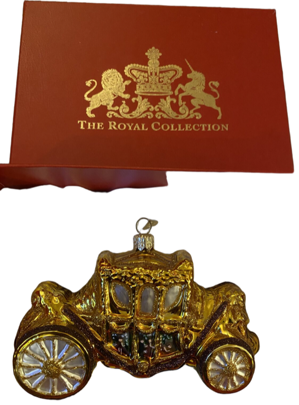 A gilded coronation coach ornament in a red silk-lined presentation box